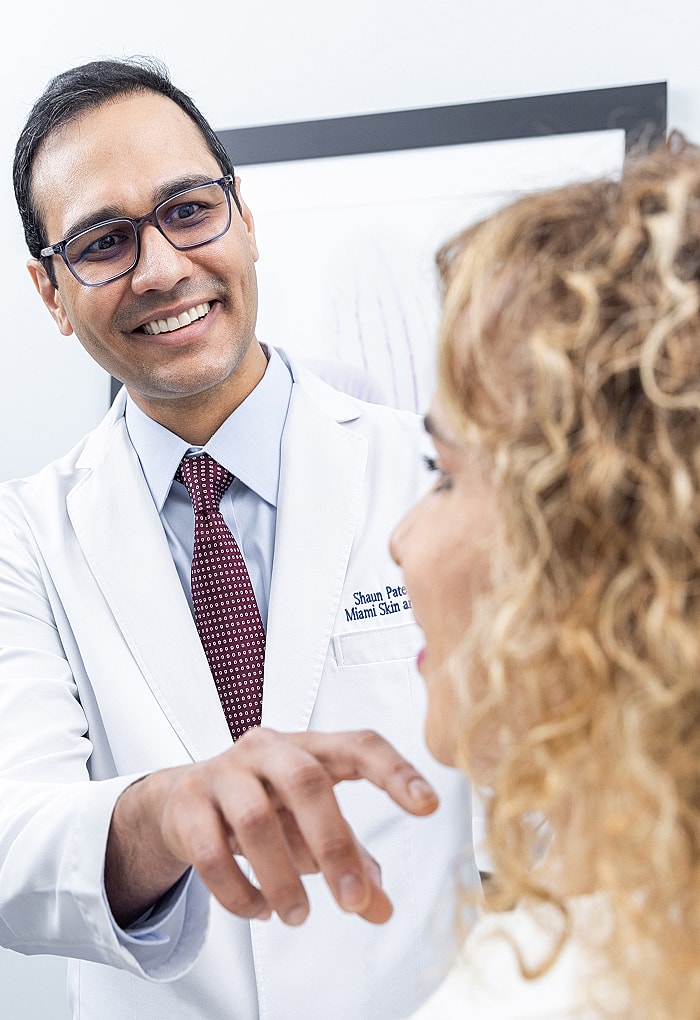 Doctor consulting with a patient in a clinic.