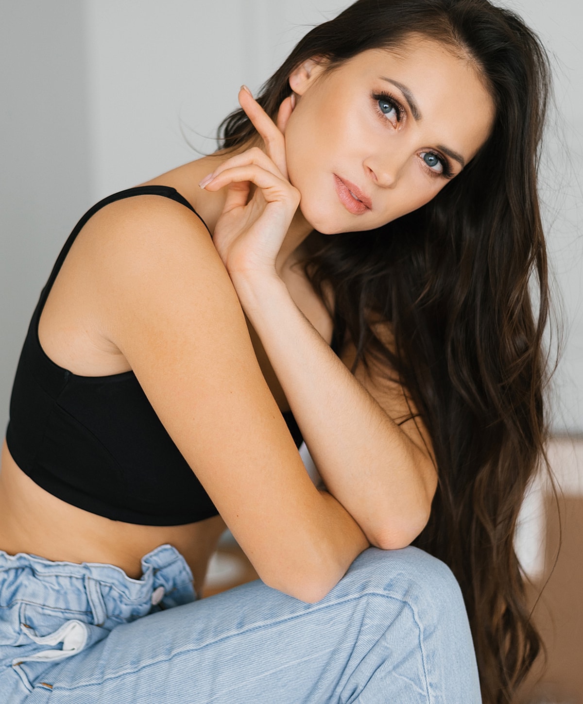 Doctor administering treatment to woman in clinic.