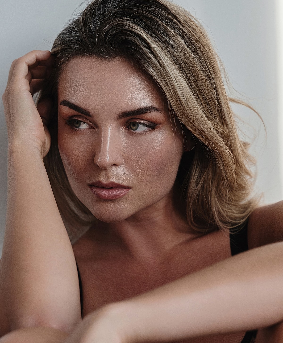 Doctor administering treatment to woman in clinic.