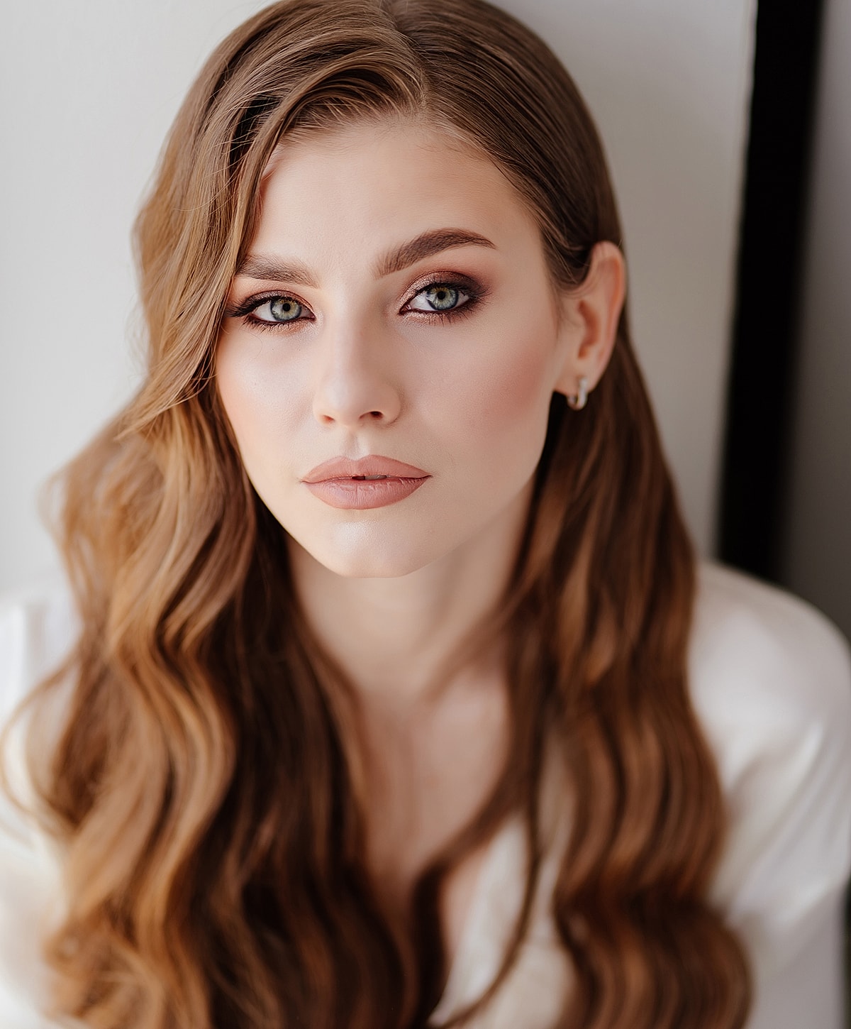 Doctor administering treatment to woman in clinic.