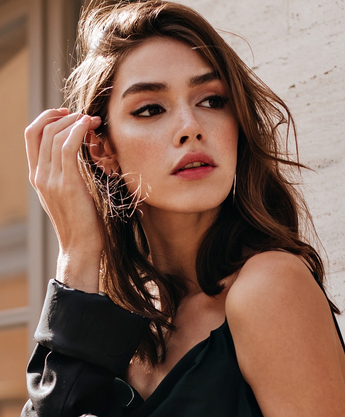 Doctor administering treatment to woman in clinic.
