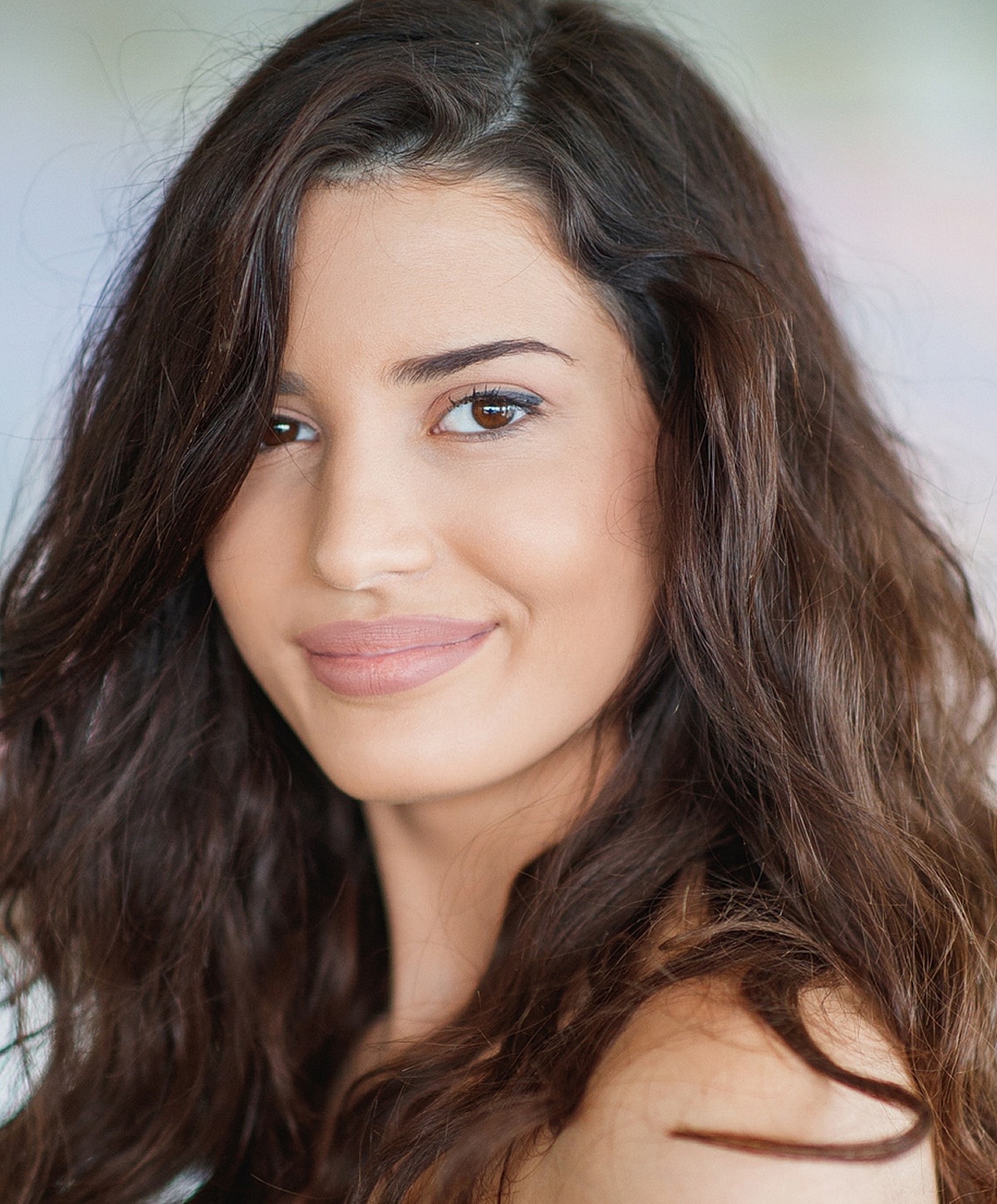 Professional man smiling in a business suit.