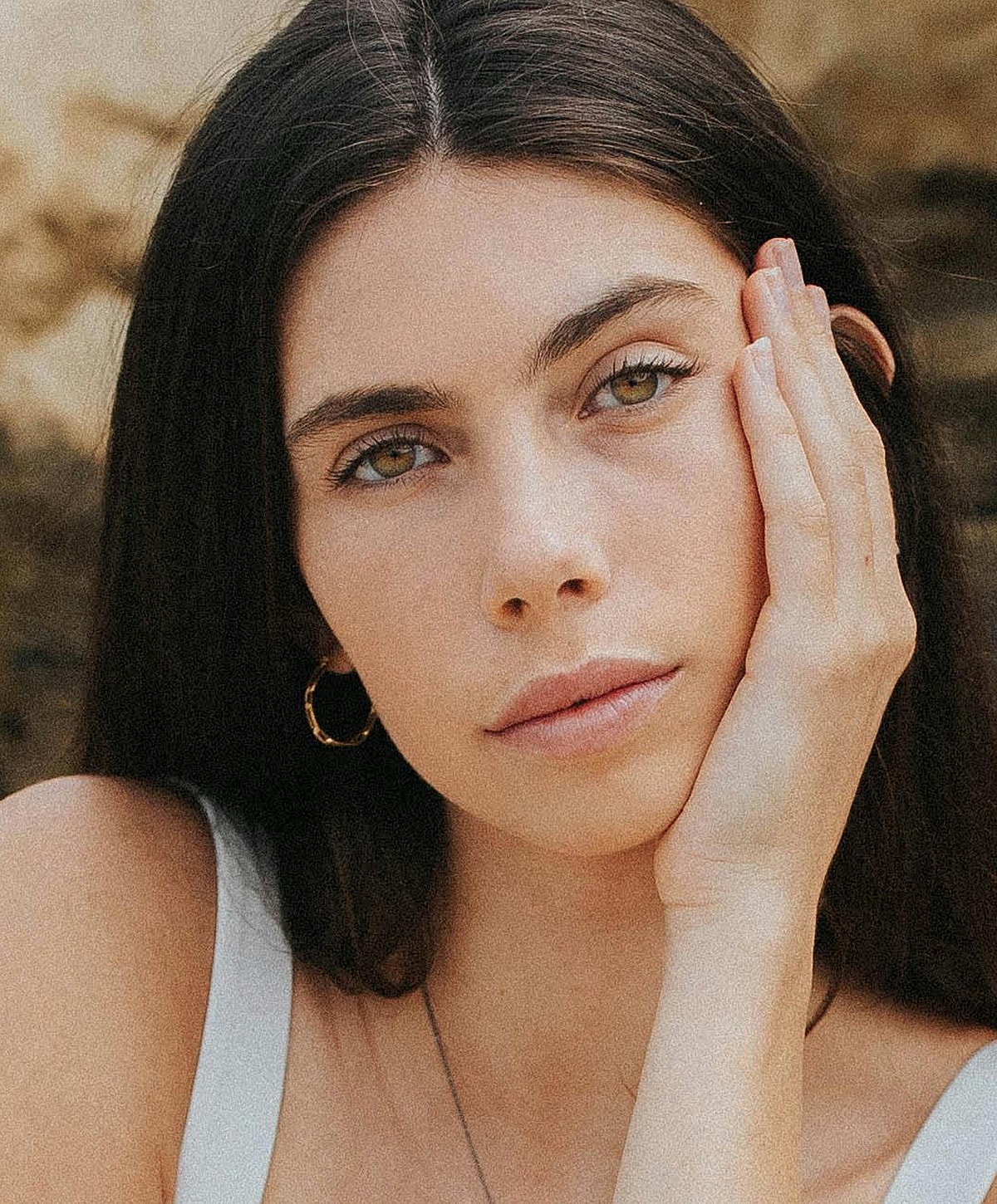 Doctor administering treatment to woman in clinic.