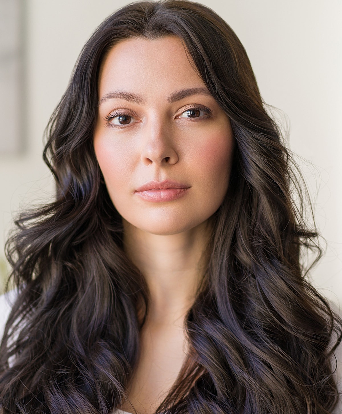 Doctor administering treatment to woman in clinic.