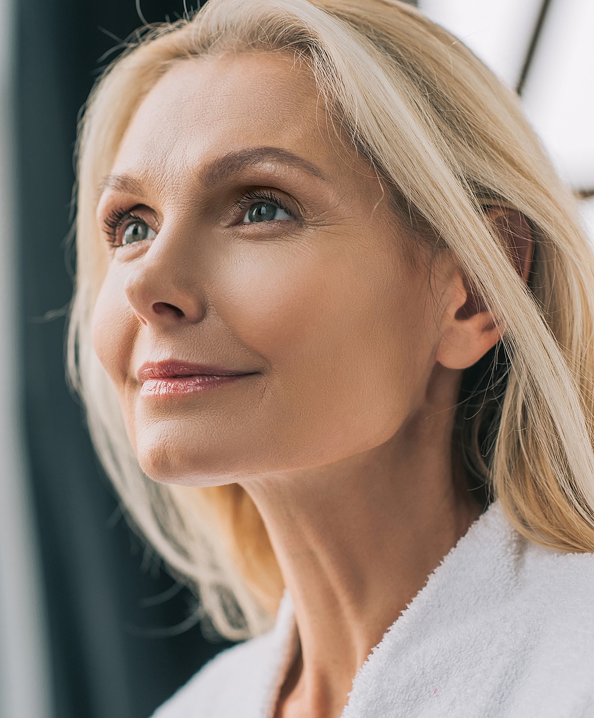 Professional man smiling in a business suit.