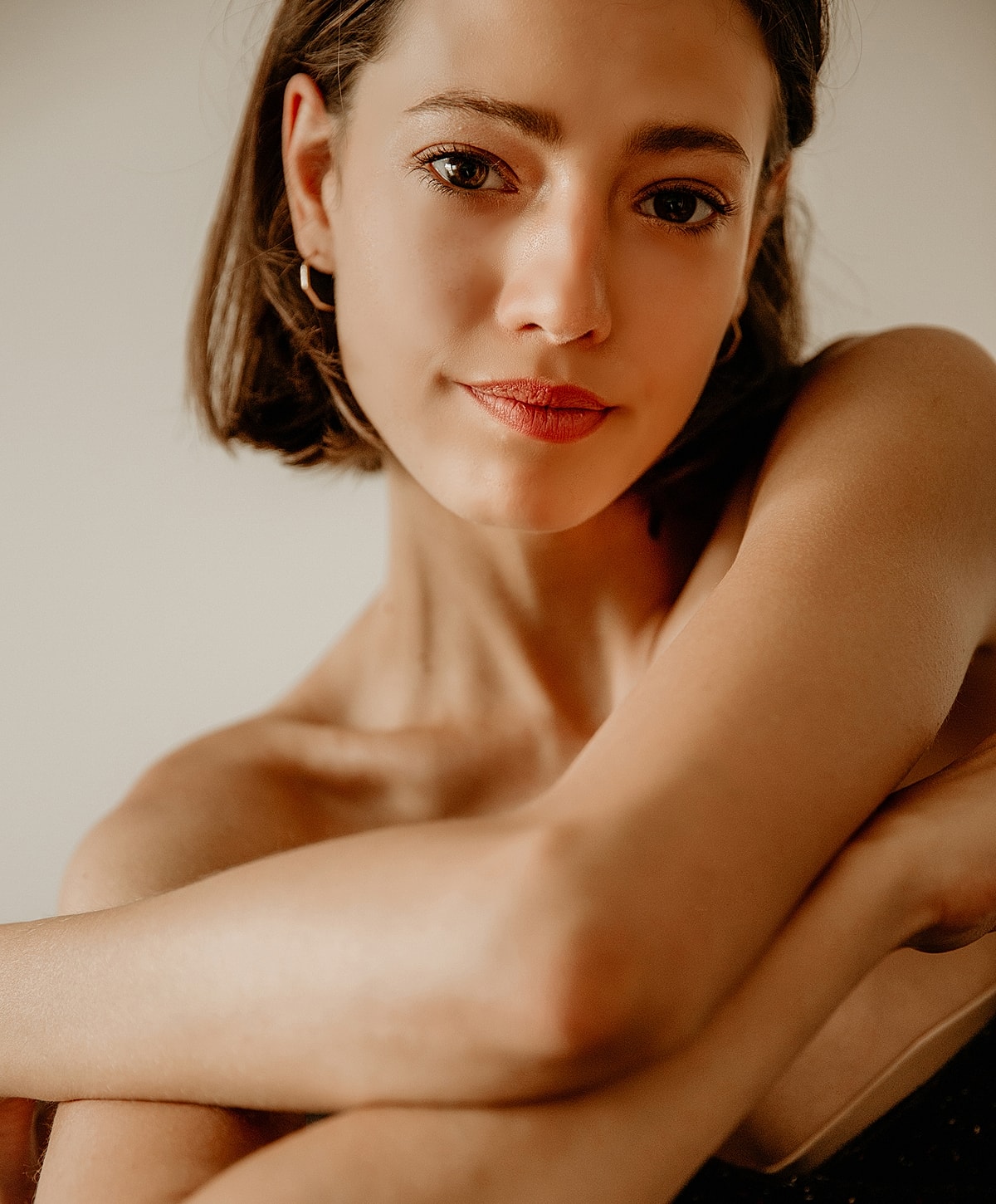 Doctor administering treatment to woman in clinic.