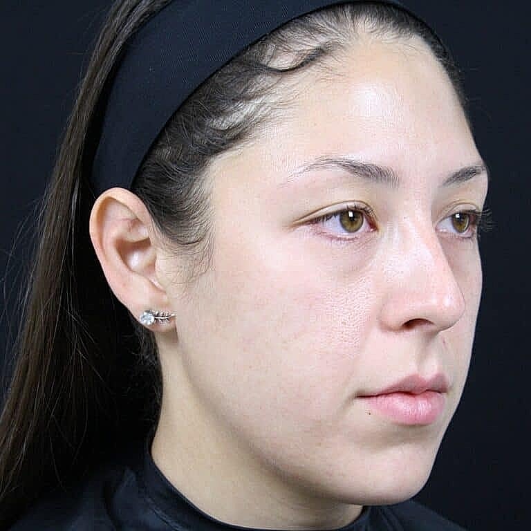 Profile of a woman with natural makeup.
