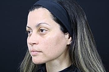 Profile of a woman with long hair.