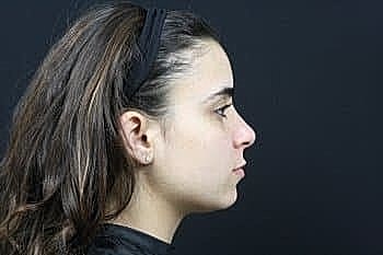 Profile of a girl with long hair.
